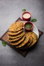 Palak Poori or spinach puri served with chutney, Indian food